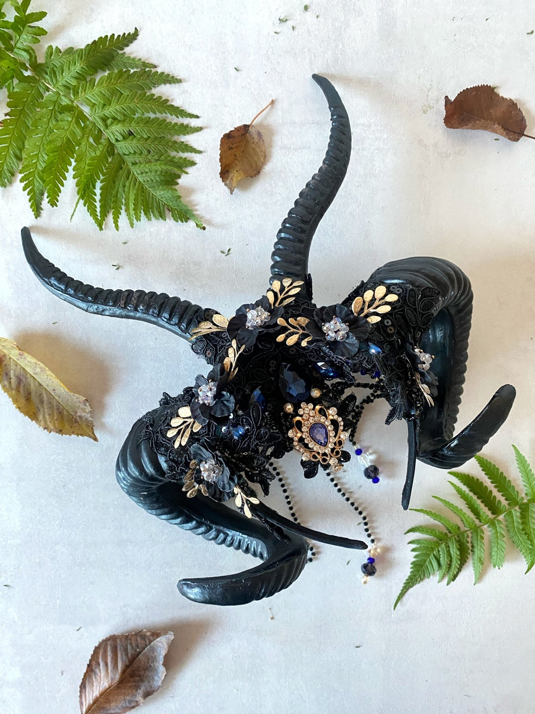 Glam black horns crown with blue and gold accent: magical accesory for fantasy ball – handmade floral hair accessory by magaela