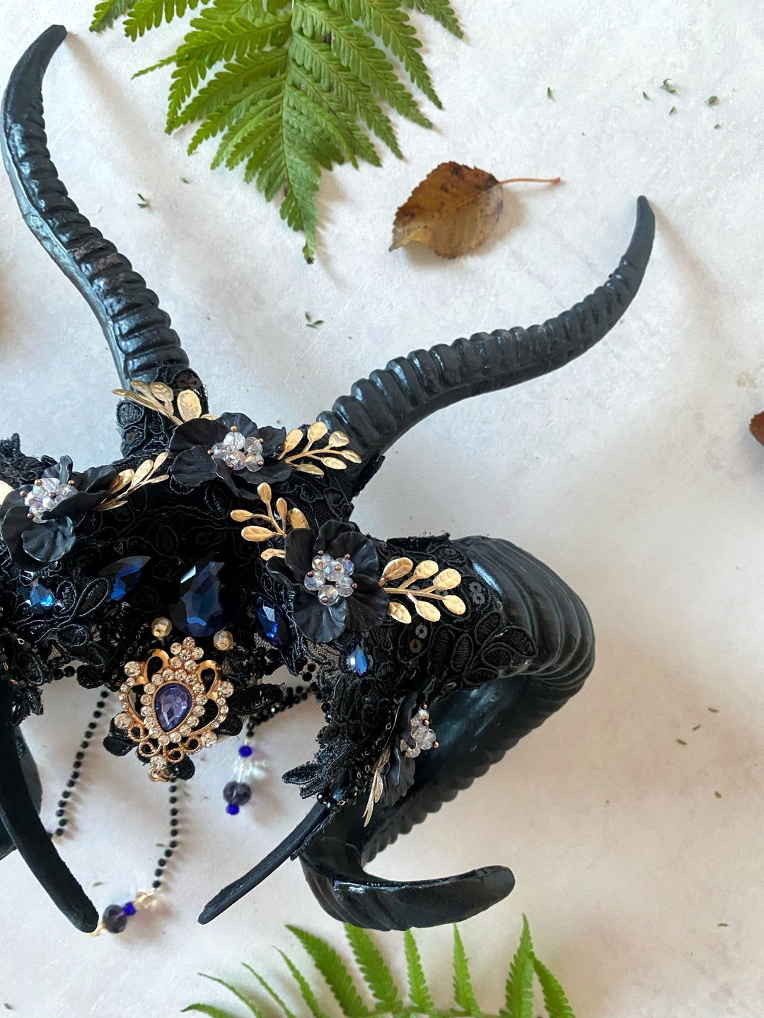 Glam black horns crown with blue and gold accent: magical accesory for fantasy ball – handmade floral hair accessory by magaela