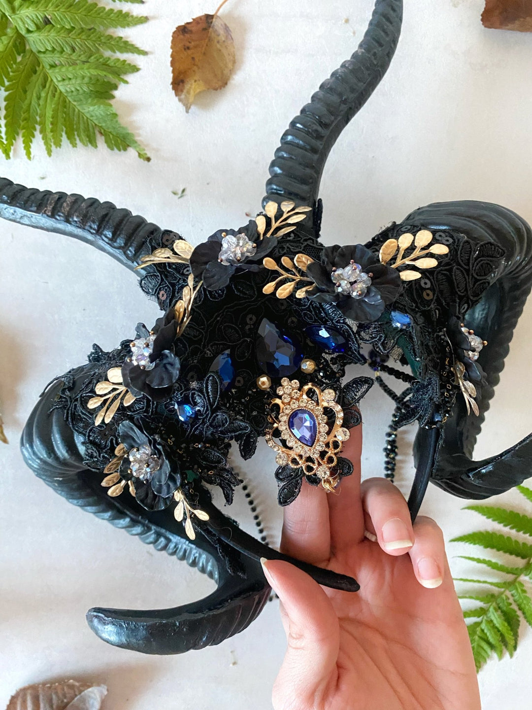 Glam black horns crown with blue and gold accent: magical accesory for fantasy ball – handmade floral hair accessory by magaela