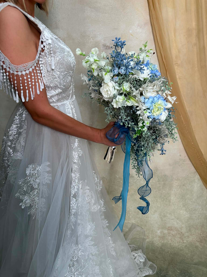 Blue and White Wedding Bouquet with Hydrangea, Ranunculus, Sweet Pea and Gypsophila