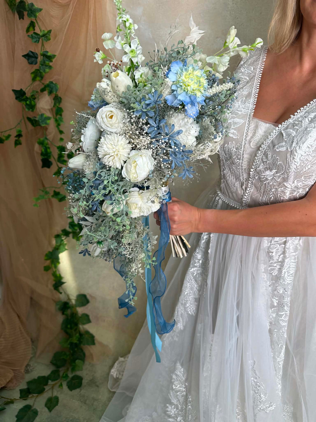 Blue and White Wedding Bouquet with Hydrangea, Ranunculus, Sweet Pea and Gypsophila