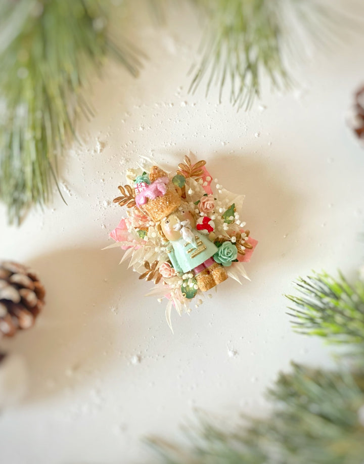 Pastel Nutcracker Christmas Brooch | Mint and Pink Roses and Golden Leaves – handmade floral hair accessory by magaela