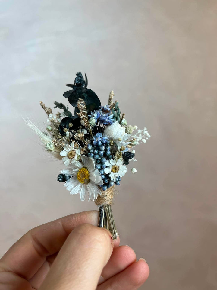 Rustic dried boutonniere in blue, reen and white tones