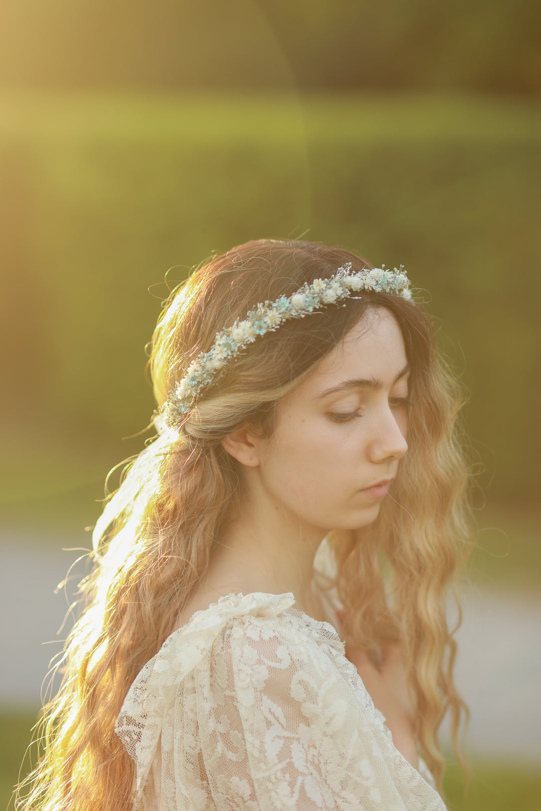 Blue and cream dried flower bridal crown worn in loose wavy hair, golden hour bridal portrait, handmade by Magaela 