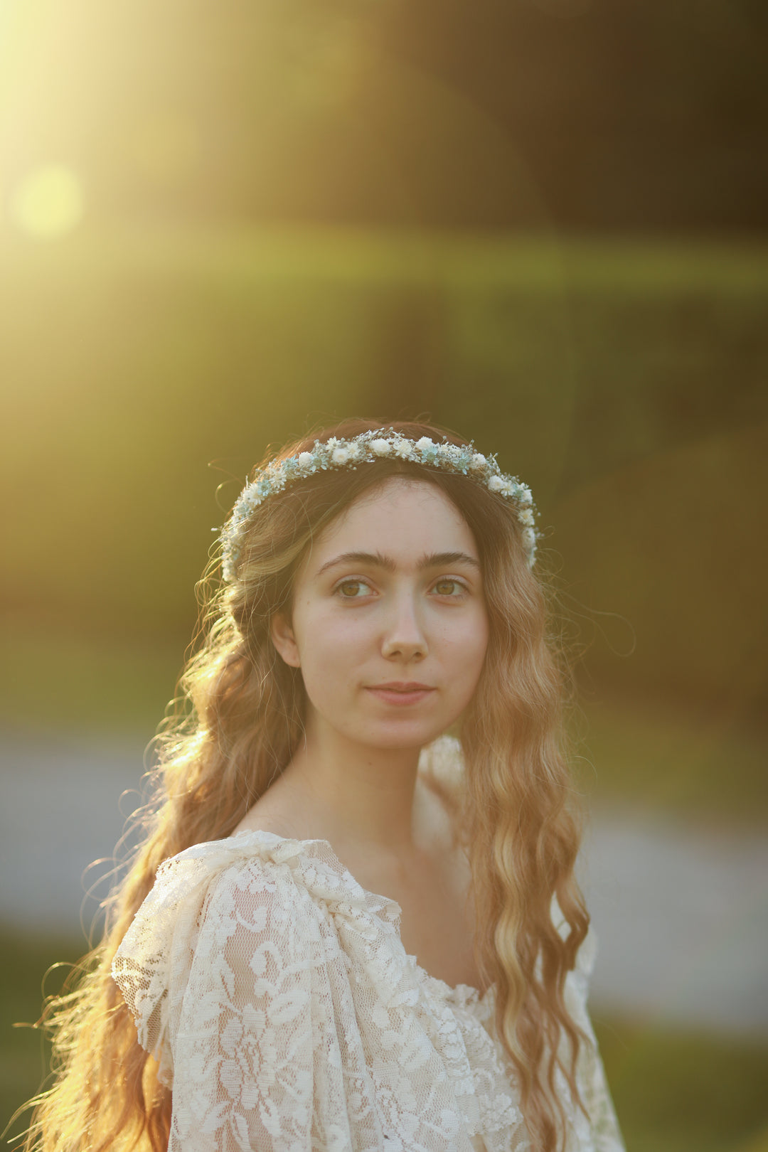 Blue and cream dried flower bridal crown worn in loose wavy hair, golden hour bridal portrait, handmade by Magaela 