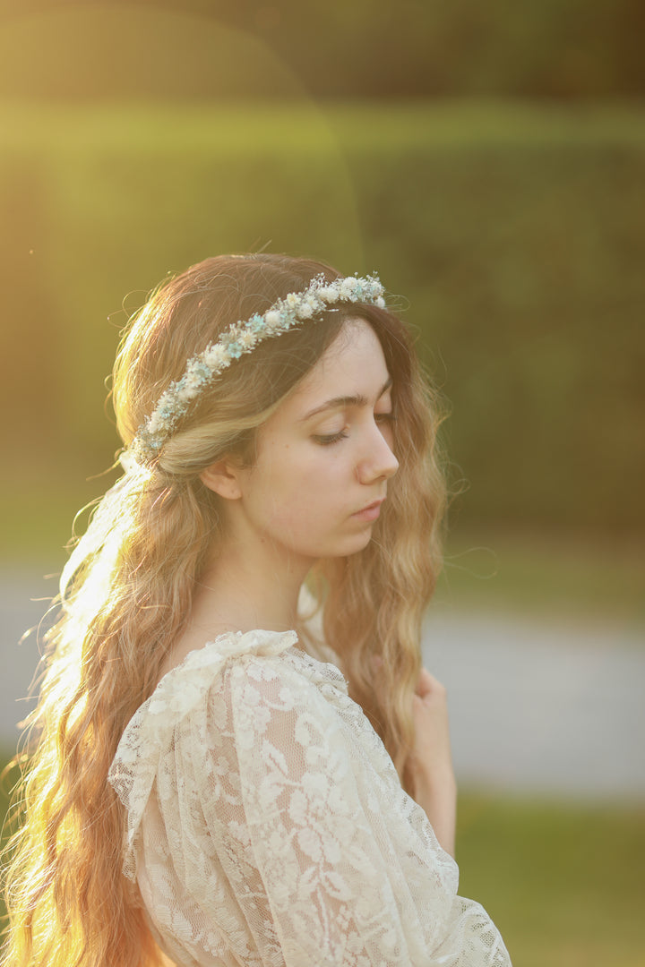 Blue and cream dried flower bridal crown worn in loose wavy hair, golden hour bridal portrait, handmade by Magaela 