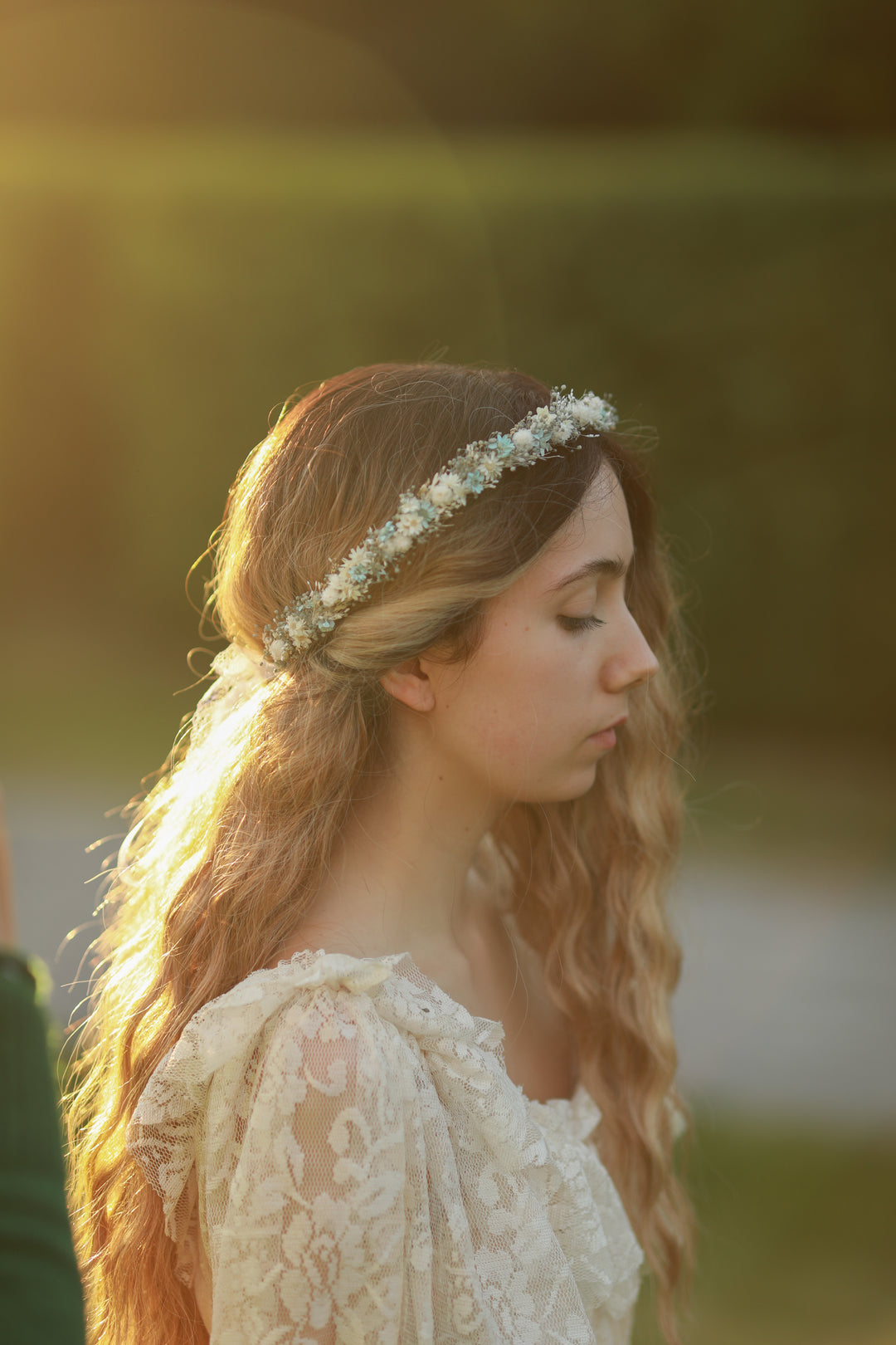 Blue and cream dried flower bridal crown worn in loose wavy hair, golden hour bridal portrait, handmade by Magaela 