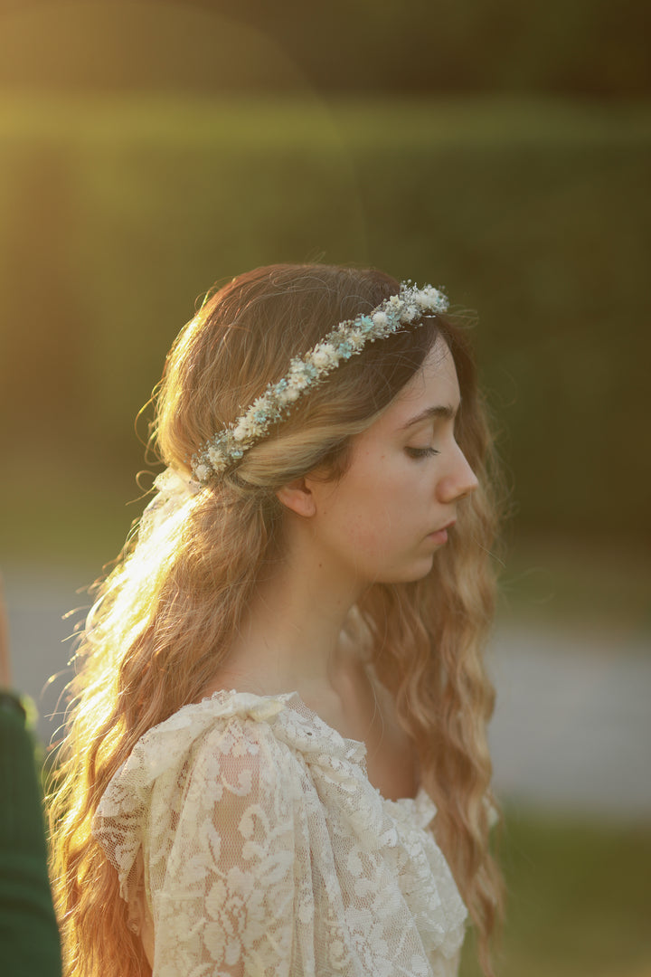 Blue and cream dried flower bridal crown worn in loose wavy hair, golden hour bridal portrait, handmade by Magaela 