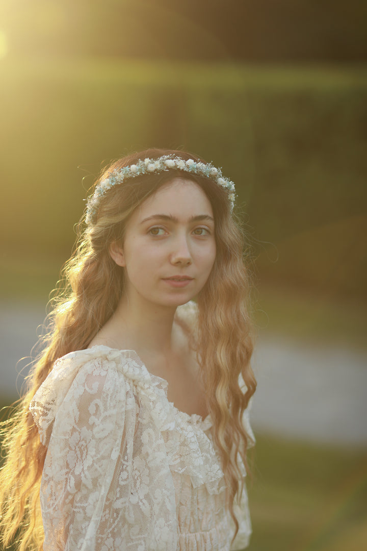 Blue and cream dried flower bridal crown worn in loose wavy hair, golden hour bridal portrait, handmade by Magaela 