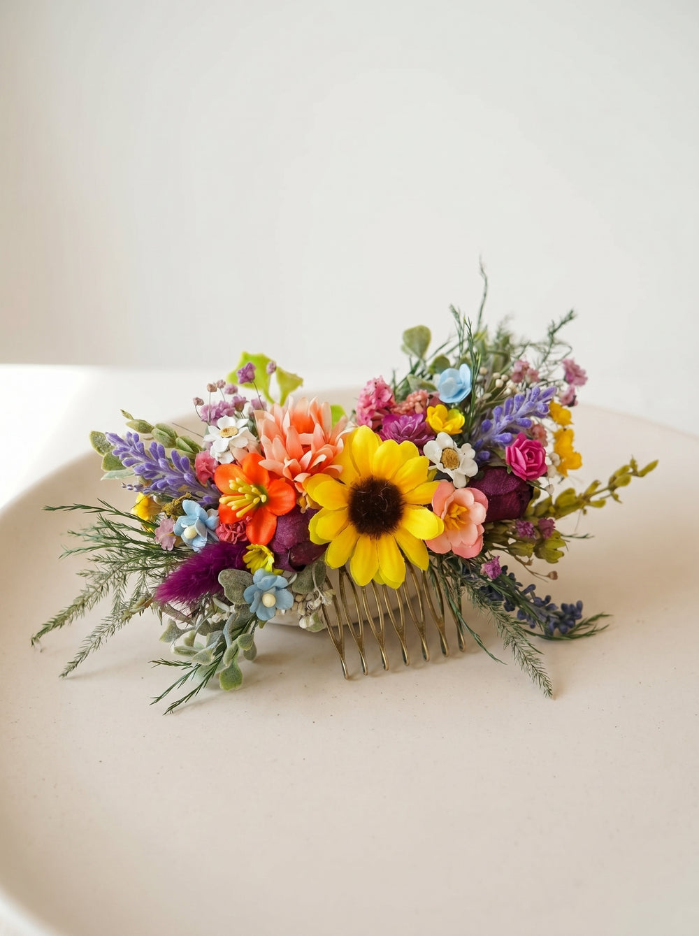 Colorful floral hair comb on a white background