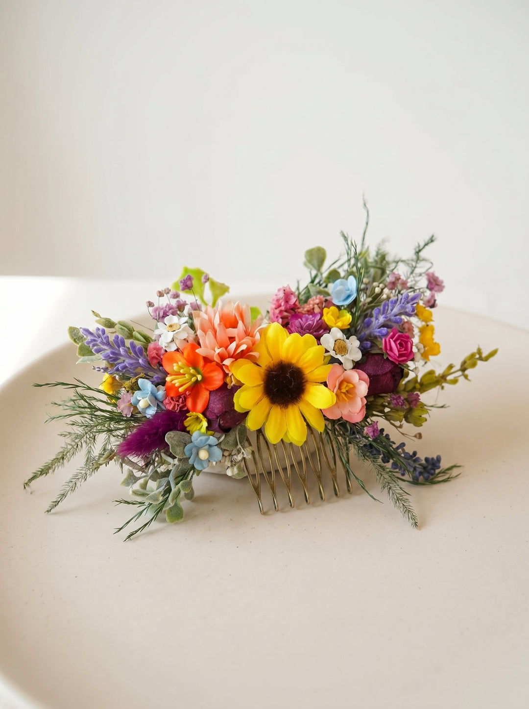 Colorful floral hair comb on a white background