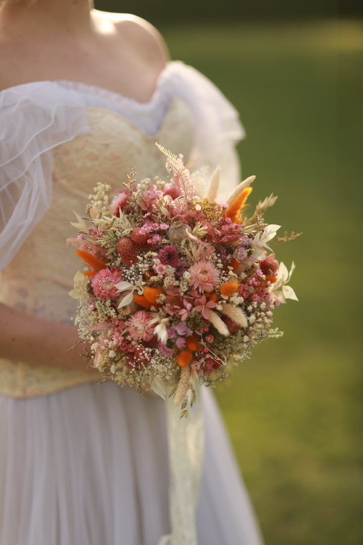 Pink, orange and cream dried and preserved bridal bouquet
