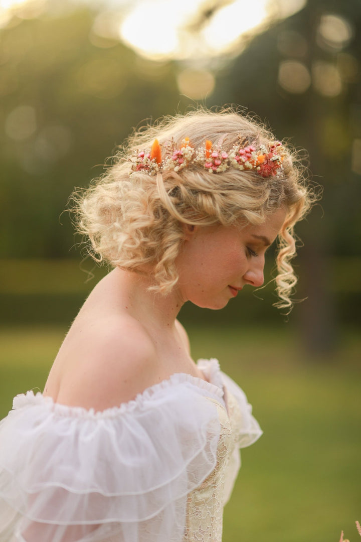 Woman with floral dried hairpins in a natural setting