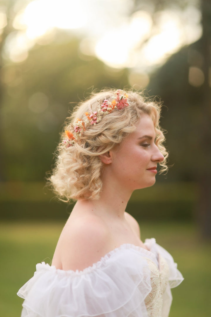 Woman with floral natural rustic hairpins in a natural setting
