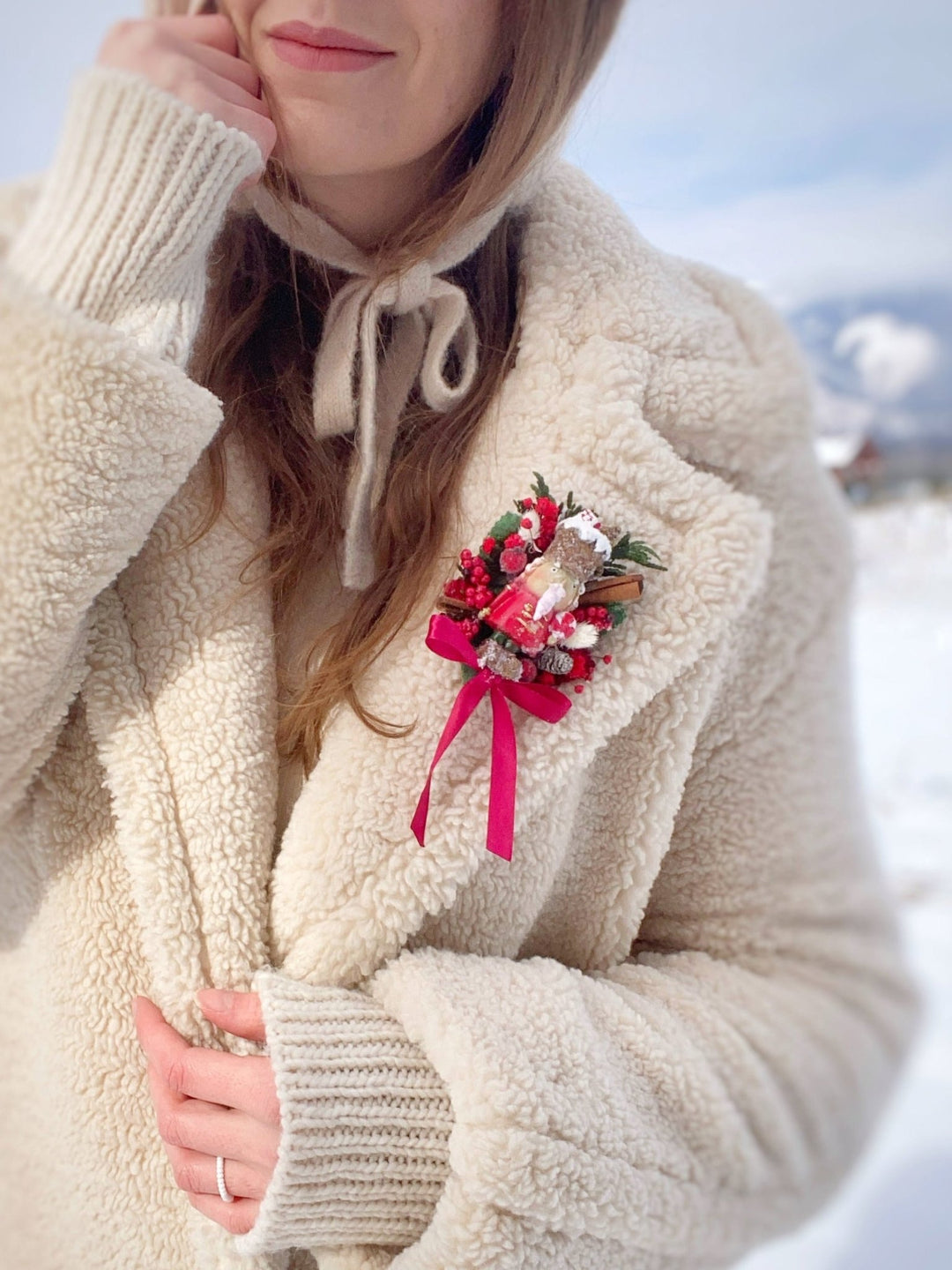  Limited edition handmade Nutcracker Christmas brooch with red berries, pine cones, cinnamon and a bow for coats, hats and scarves