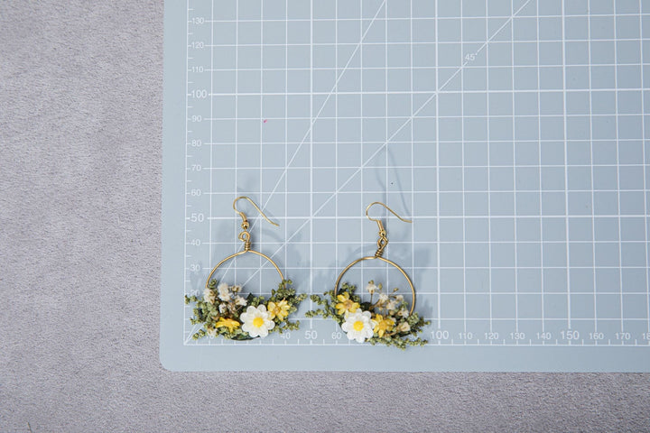 Meadow Flower Circle Earrings: Handmade Yellow & White Floral Jewelry – handmade floral hair accessory by magaela