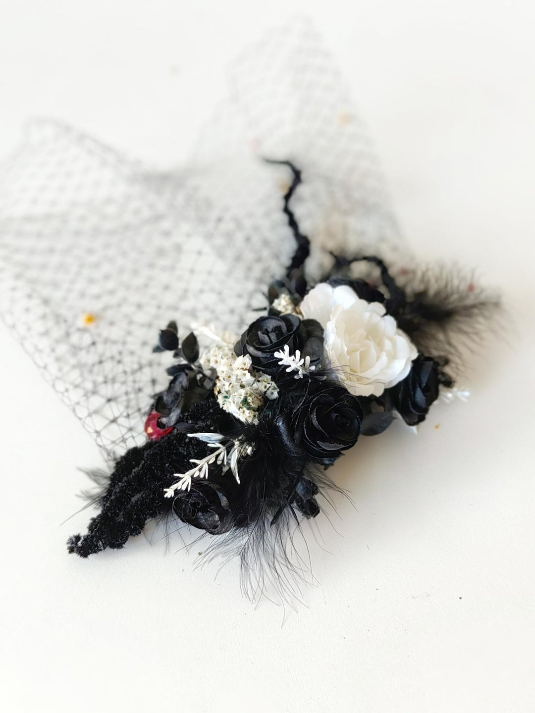 Gothic Wedding Fascinator: Black & White Rose Hair Clip with Birdcage Veil – handmade floral hair accessory by magaela