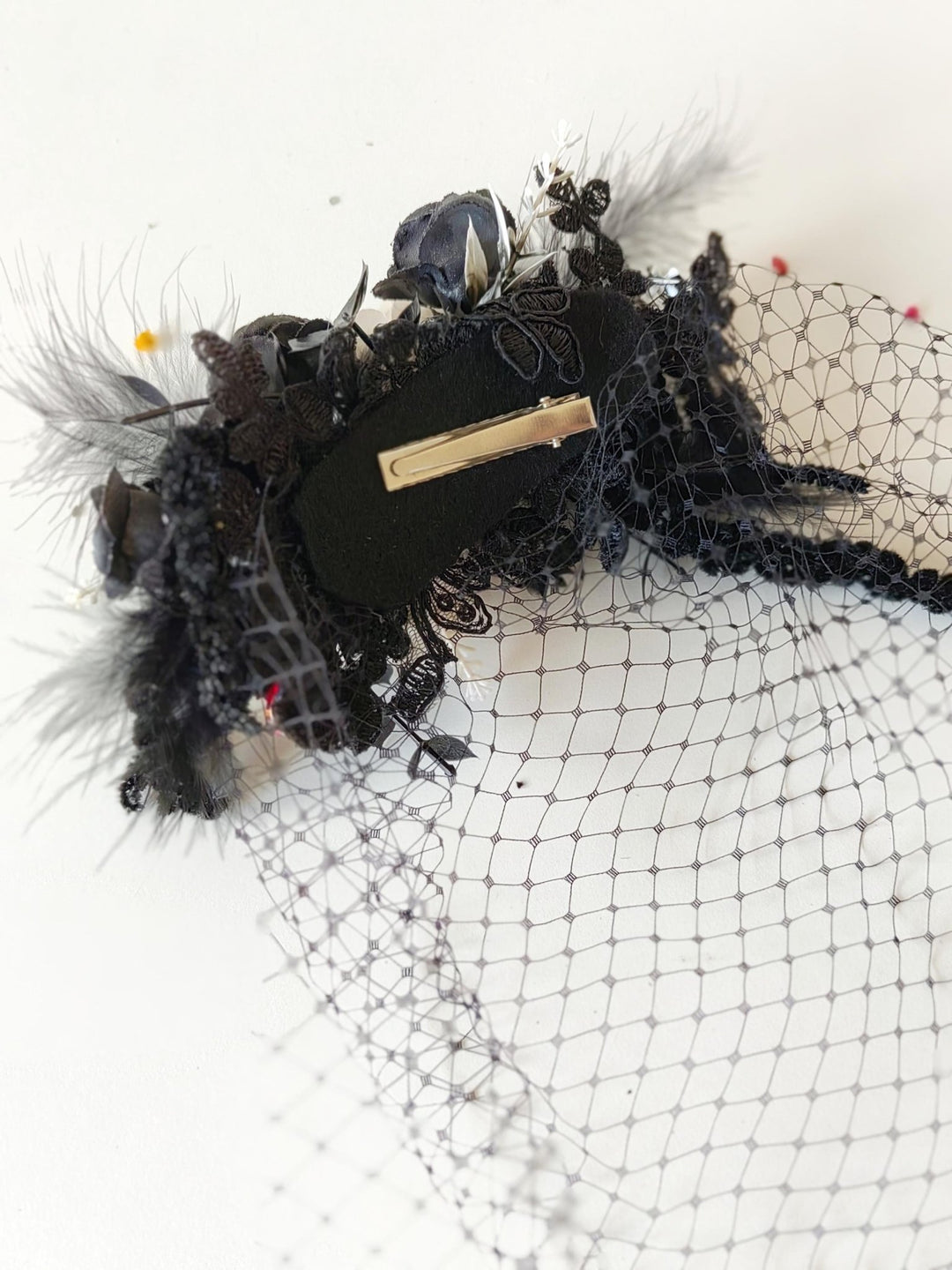 Gothic Wedding Fascinator: Black & White Rose Hair Clip with Birdcage Veil – handmade floral hair accessory by magaela