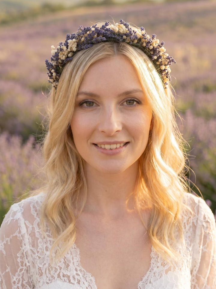 Woman wearing a floral lavender headband in a lavender field