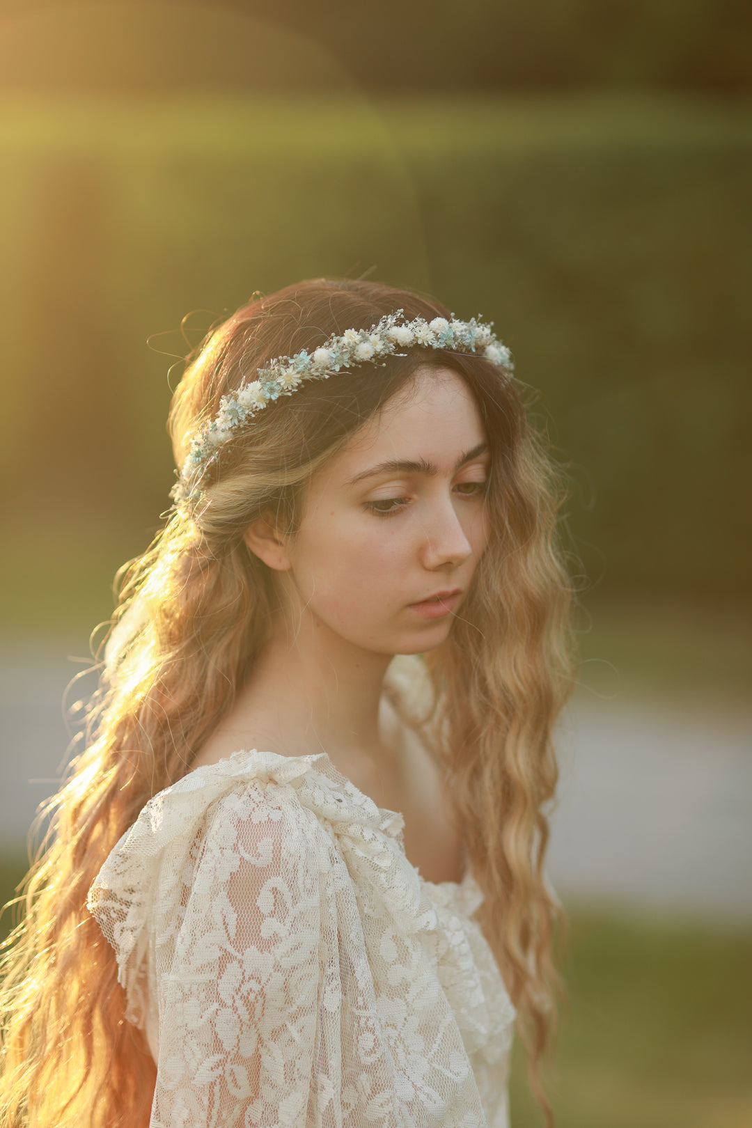 Blue and cream dried flower bridal crown worn in loose wavy hair, golden hour bridal portrait, handmade by Magaela 