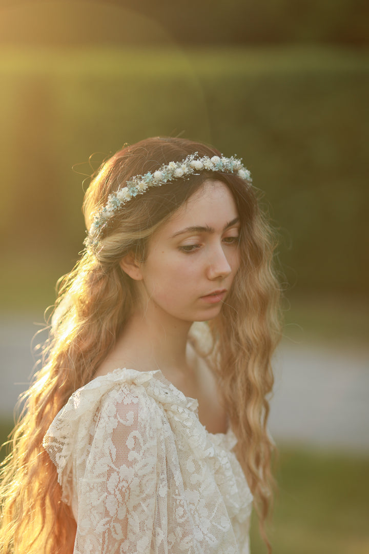 Blue and cream dried flower bridal crown worn in loose wavy hair, golden hour bridal portrait, handmade by Magaela 