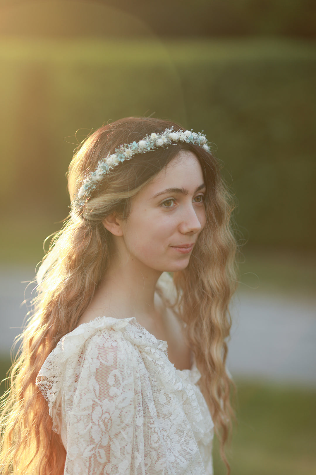 Blue and cream dried flower bridal crown worn in loose wavy hair, golden hour bridal portrait, handmade by Magaela 