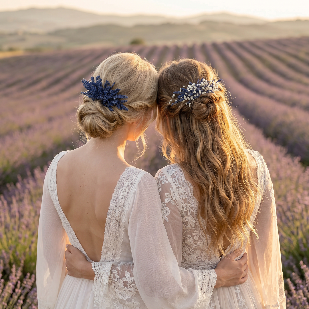 Two women in white dresses standing in a lavender field with their backs to the camera with hair combs in hair.