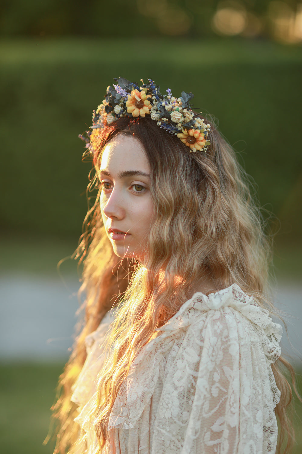 Woman with a floral crown in a natural setting